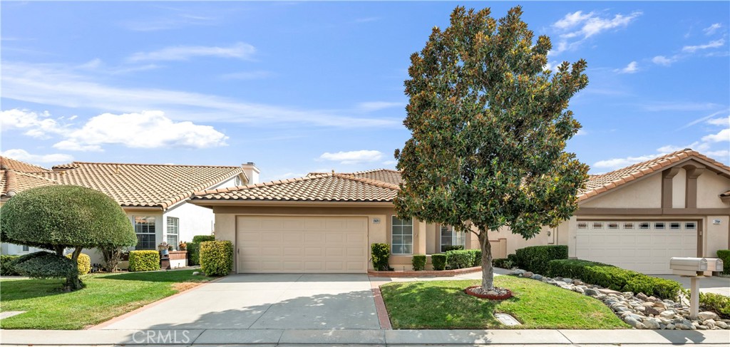 Lovely Muirfield model in Sun Lakes Country Club, a stunning 55+ community in Banning. This 3-bedroom, 2.5-bath home with loft and family room offers 1,846 sq. ft. of comfortable living. A double-door entry welcomes you into a bright, open floor plan with abundant natural light and freshly painted white walls. The spacious living and dining areas flow nicely for entertaining. The kitchen features ceramic tile flooring, updated painted cabinets, and appliances including the refrigerator. The downstairs primary suite is open and airy with a sliding door to the patio and an en-suite bathroom featuring dual sinks. Upstairs has been fully refreshed with all new carpet, paint, and ceiling fans in each room, along with two bedrooms, a full bath, and a loft area. Other highlights include mirrored closet doors, ample garage storage with built-in cabinets and attic ladder, a solid Alumawood patio cover, fresh exterior paint, new landscaping, and new carpet throughout the home.
Sun Lakes Country Club offers resort-style living with two golf courses, three clubhouses (one with a full-service restaurant and lounge), three swimming pools including an indoor pool, tennis and bocce ball courts, and countless clubs and social activities. The perfect blend of comfort and community.