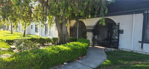 Photo of 1319 Oakwood Drive #11, San Bernardino, CA 92405 (MLS # IG26197520)