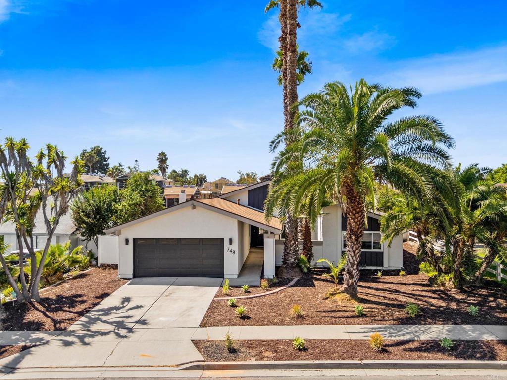 This home is the best of both worlds. Open concept, but retains the defined living spaces. Divided layout has all the bedrooms on one side of the home and the main living spaces on the other. Freshly renovated with LVP floors, fresh paint, updated fixtures, and remodeled bathrooms. The spacious primary is complete with walk in closet and ensuite bathroom with dual vanities. The kitchen was upgraded with white shaker cabinets, quartz countertops, and stainless steel appliances. This flat expansive lot allows for a large bag yard with a big patio. Come see this beauty yourself today!