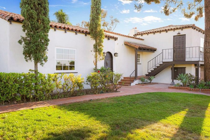 Welcome to 700 Wakefield Ct - The original model home of Fletcher Hills. This Spanish Colonial style home, built in 1929, stands as a symbol of history being the very first development in Fletcher Hills. Alongside its history, this exquisitely unique single-family home with attached Casita offers 2,131 square feet of beautifully restored living space, blending contemporary amenities with idyllic charm. With its thoughtful design and updates, this home is perfect for comfortable living and entertaining. Original hardwood floors flow seamlessly throughout the home, adding warmth and elegance to every room. Experience the best of indoor/outdoor living with a deck, balcony, and two private patios, where you will find a built-in barbecue and outdoor grill area. Tucked away, beyond the hedges, discover an entertainer's paradise with a separate pool area that invites you to lounge and relax in privacy. The beautifully landscaped front and back yards offer serene spaces to enjoy and appreciate.