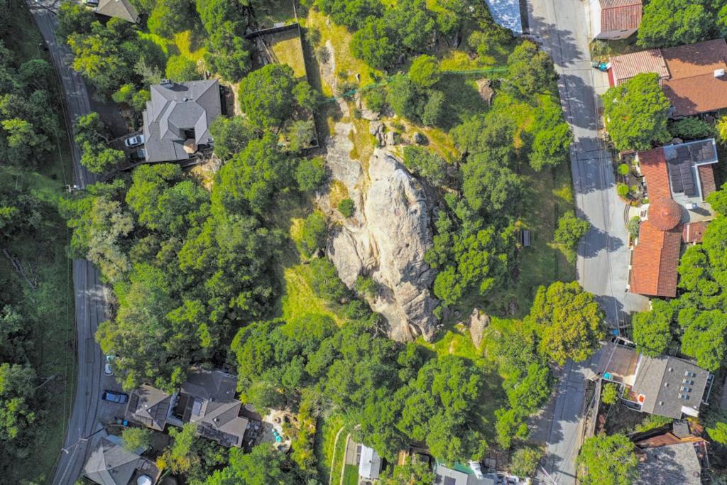 Exceptional Emerald Hills vacant land opportunity located just below Handley Rock Park on Sylvan Drive. This spacious 14,672 square foot lot presents the perfect canvas for creating your dream home in a remarkable location. Private park-like setting with views of the canyon, Handley Rock, trees and a small seasonal creek running through the property. This sought-after Cordilleras Heights location is a private woodsy retreat. Close to major transportation routes (280/101), San Carlos, Redwood City & much more!