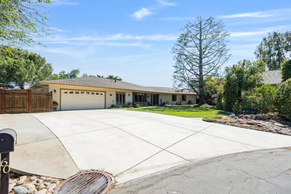 Better Than New Stunning View Home in Gated Community Located at the end of a peaceful cul-de-sac in an exclusive gated community, this better-than-new residence offers privacy, elegance, and views that go on forever. With no neighbors behind you, the backdrop is an endless panorama, best enjoyed from the expansive back deckperfect for morning coffee, evening sunsets, or entertaining under the stars. The beautifully landscaped yard is mature and inviting, yet low-maintenance. Inside, a formal living room welcomes guests, while the spacious great room with an open-beam ceiling and the fireplace is the focal point of the room. The large kitchen is a chefs delight, complete with a breakfast bar, generous dining area, and extensive built-in cabinetry for effortless storage and organization. The primary bedroom is spacious, with a well appointed bathroom and roomy closet. The other three bedrooms are also spacious. The bathroom off the other bedrooms have double sinks and a door separating the shower area for convenience. The oversized garage has access to the half bath which adds functionality, while the homes thoughtful layout blends comfortable everyday living. From the quiet street location to the incredible outdoor spaces, this property needs you. #Ridgemark#Outsideliving