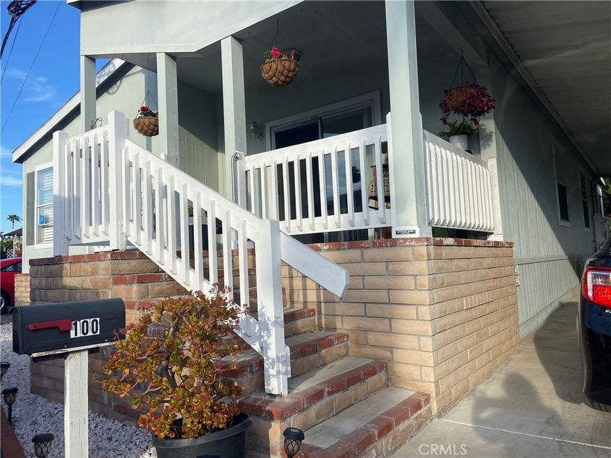55+ COMMUNITY -NEW UPGRADES:This hidden gem has it's own street entrance, don't overlook this charming home that's been cared for and still feels fresh and has that new home feel ! Natural light from the large skylight in the kitchen and master bath fills the space, highlighting the laminate hardwood floors and vibrant kitchen. The upgraded kitchen features  NEW stainless steel appliances, a spacious island with NEW quartz countertops and plenty of storage, Smooth ceilings add to the modern vibe, and there's a deck off the dining room for outdoor enjoyment. Speaking of outdoor enjoyment there is a hiking trail right across the street. Plus, there's a bonus room that can serve as an office, extra bedroom, or expanded living space. With its central location, there is a friendly locally owned coffee shop within walking distance & you're just a quick 15 minute-drive from downtown and the beach. Don't wait too long - this home won't be available for much longer!