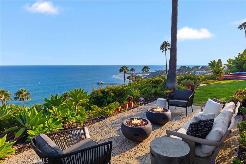 Create your own paradise in one of Malibu’s most exclusive enclaves! Nestled on Sweetwater Canyon Drive, this single-story home is prime for redevelopment or customization. Sited within a private gated community of just 21 residences, each with breathtaking views of the Queen’s Necklace, Catalina Island, and Big Dume Beach and perched above iconic NOBU and Soho House Malibu, this property offers direct vistas of the Malibu Pier and the legendary Surfrider Beach. The expansive, over one acre property features a large motor court and unrivaled privacy set at the end of a gated driveway just minutes from PCH, offering seclusion and convenience. Spectacular panoramic views and ocean vistas surrounded by Malibu's natural beauty all steps from Malibu's premier lifestyle destinations.