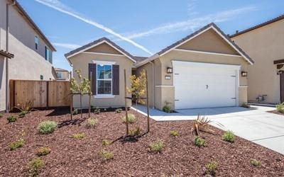Walkable tree-lined streets. Nearby parks, schools, shops and restaurants. These are the hallmarks of a classic neighborhood, and you'll find them all at Cerrato. Located a few blocks from Downtown Hollister, This efficient home is ideal for those who desire the convenience of a first-floor owners suite, which offers complete privacy at the rear. Two more first-floor bedrooms are perfect for guests or a home office. Filled with plenty of useful storage including a walk-in storage room, walk-in pantry, and lots of closets and built-in shelving throughout, organization is a breeze in The Heirloom.