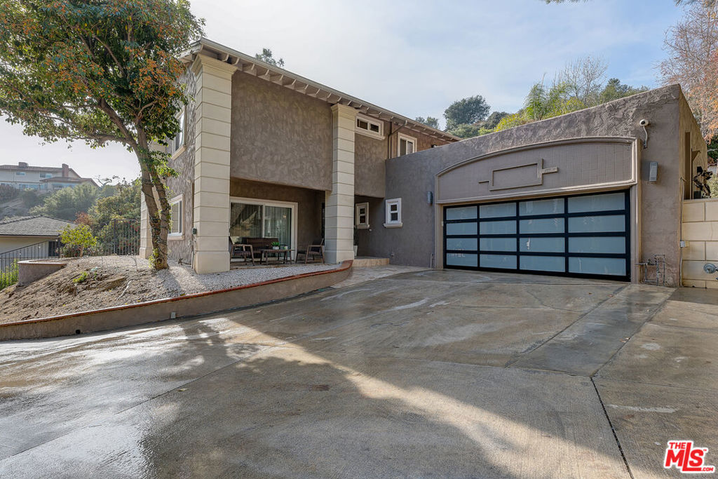 New price!!! Welcome to 1523 Colina Dr., a beautiful, private retreat nestled on a serene cul-de-sac that ensures peace and privacy. This exquisite home offers the perfect balance of luxury and comfort, featuring a private gated driveway that offers ample parking of up to 6 vehicles in the driveway and 2 in the garage. Inside, you'll find spacious living areas, including a separate living room and dining room ideal for both family gatherings and intimate dinners. The separate family room/den offers a flexible space that can easily adapt to your needs. The tasteful kitchen is a chef's dream, complete with granite countertops and stainless steel appliances, perfect for culinary adventures. The entertainers' backyard is a true oasis, featuring a sparkling pool with spa that invites relaxation and enjoyment year-round. Inside, the home offers gleaming hardwood floors, recessed lighting, and ample closet space, ensuring both style and functionality through out. The large bedrooms provide comfort and privacy with a junior master that has a walk-out rooftop deck overlooking the serene backyard. The beautiful master suite boasts a spacious and luxurious invite with a dedicated makeup station perfect for preparing for those moments of outings in your own glamour studio. Additional features include a dedicated laundry area, a fully finished 2-car attached garage with air conditioning and a built in sink. The home was recently upgraded with a 400 amp electric panel. Located within walking distance to Verdugo Park, minutes from downtown Glendale, the Americana, and Glendale Galleria this property combines luxury, convenience with tranquility. Text the listing agent for showing instructions to show. A must-see to truly appreciate! Easy to show! By appointment only and 24 hour prior notice. Contact listing agent via Text. Include your business card in text message and please wait for agents confirmation to your appointment.