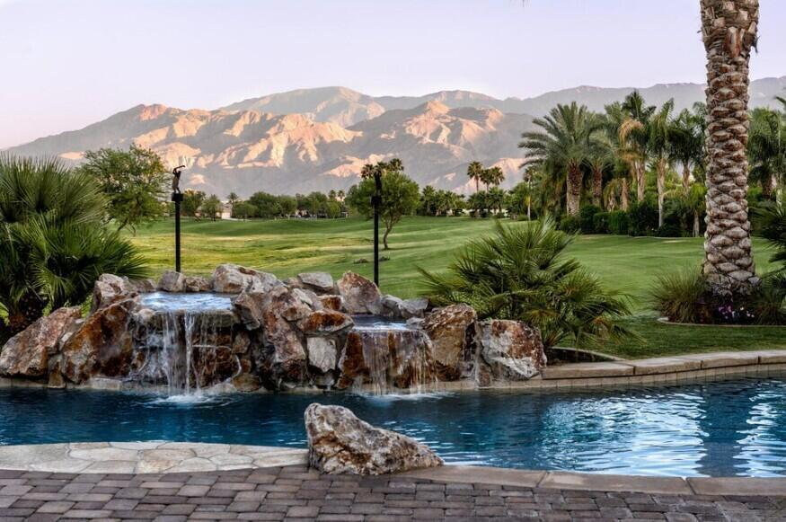 Welcome to this exquisite single-family home at 81305 Legends Way, nestled in the prestigious PGA West Country Club community in La Quinta, CA. With 4,132 square feet of luxurious living space, this residence offers an ideal blend of comfort and elegance. The home boasts four spacious bedrooms and three and a half well-appointed bathrooms, A detached two room casita will ensure ample space for both family and guests.As you step outside you'll be captivated by the stunning south-facing views of the majestic mountains and the wide fairways of the Weiskopf private course. Luxuriate in the sparkling pool & spa or the extensive pool & patio lounging area.The great room is the heart of the home, featuring a beautiful limestone fireplace, a wet bar, and a large well appointed kitchen with island that invites relaxation and social gatherings.The property's curb appeal is enhanced by a 'pavered' driveway welcoming you to this remarkable home. Don't miss the opportunity to own a piece of paradise in La Quint