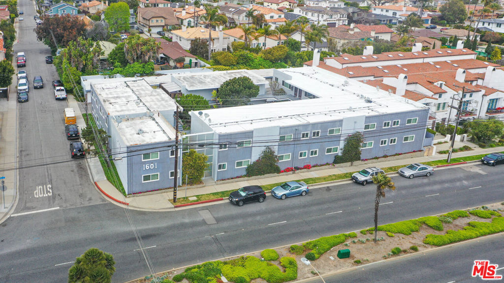 A rare, LARGE investment opportunity in irreplaceable "90266" - mere minutes to world famous sand and surf. The twelve 1 Bed units are ideal for the typically young, single renters in The Beach Cities, whereas the eight 2 Bed units and one 3 Bed unit appeal to couples and work-at-home renters. Additionally, the building has newer, dual-pane windows and copious parking with 21 enclosed garage spots - not that common in buildings closer to the sand. Also, this highly-accessible location near Aviation has wider appeal than units near The Strand - an approachable "beach" option for many renters means high occupancy, all the time. A friendly, 'community' vibe is highlighted by comfortable, landscaped common areas with umbrellas, tables and chairs. And walking distance to award-winning Mira Costa High School. High-demand units in an even higher-demand location means capital appreciation is nearly guaranteed, for a savvy Buyer. And on a potentially larger scale, the 21K sq. ft. lot allows for ADU additions and/or ground-up condo or townhome development nearby townhomes on Aviation Way have sold for almost $2,000,000 each.