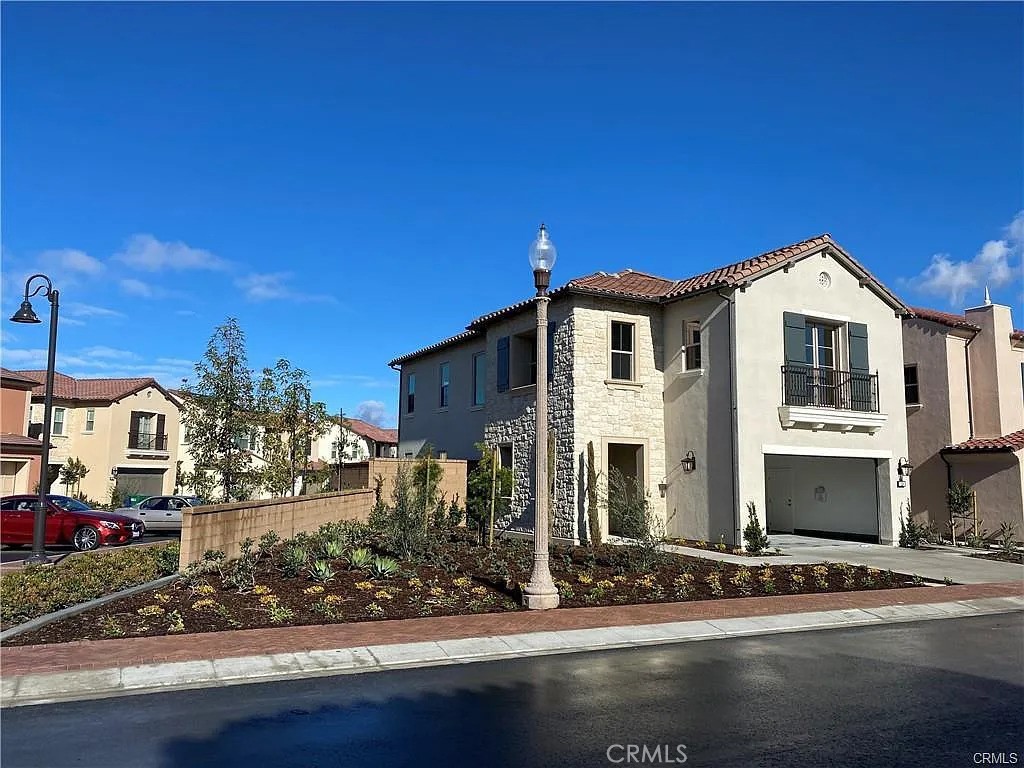 Welcome to 120 White Jasmine, a beautifully upgraded residence in the desirable Portola Springs Village of Irvine. This spacious 4-bedroom, 3-bathroom home features an open-concept layout with high ceilings, designer finishes, and abundant natural light throughout.
The gourmet kitchen is a chef’s dream, complete with quartz countertops, stainless steel appliances, custom cabinetry, and a large island perfect for entertaining. The downstairs includes a full bedroom and bathroom, ideal for guests or multi-generational living. Upstairs, you'll find a generous loft, two secondary bedrooms, and a luxurious primary suite with a spa-inspired bath, dual vanities, walk-in shower, and expansive walk-in closet.
Additional highlights include luxury vinyl flooring, upstairs laundry, attached 2-car garage, and a private outdoor patio—perfect for relaxing or dining al fresco.
Located within the award-winning Irvine Unified School District and just minutes from parks, pools, hiking trails, Woodbury Town Center, and easy access to the 5, 133, and 241 freeways. Enjoy resort-style amenities including multiple pools, sports courts, playgrounds, and clubhouse.
12-month lease preferred | Unfurnished