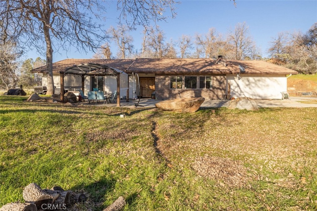 Huge $20,000 price reduction!!! Sought after Mudge Ranch area 2450+/- sq. ft. 4 bedroom, 3 bath home with 2 primary suites-1 on each end of the home! Updated kitchen and bathrooms, open floor plan, granite counter tops, newer plank flooring, newer windows, newer air conditioner and newer Pex. Lovely 1.47+/- acres with concrete patios, 2 pergolas, tile roof, 2 car garage, room for RV parking with Pines, Oaks and Manzanita trees. Newer well pump and pressure tank. Come and see for yourself everything this home has to offer!