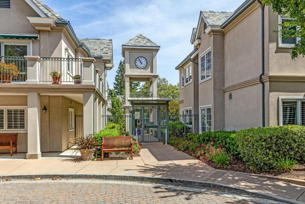 Discover an exquisite lifestyle at Parc Regent, an exclusive 55+ community just steps from vibrant Downtown Los Altos. This top-floor residence offers serene views of the lush courtyard and features meticulously updated interiors. Step into a spacious living area adorned with new stainless steel appliances, a modern sink, and a disposal unit, creating a chef's delight in your own home. The entire residence has been freshly painted and showcases all-new flooring, making it a true standout in the community. Enjoy peace of mind in this secure, gated residence, which offers an array of amenities including a sparkling pool, relaxing spa, and a fully-equipped fitness room. Engage with fellow residents through various community activities and relish the convenience of a community room where a weekday continental breakfast is served. Additional features include underground parking, personal storage spaces, and a thoughtfully designed layout. The unit boasts 1 bedroom plus a versatile transitional den, two full baths, and a luxurious primary suite complete with a sitting room and an attached closet. Experience unparalleled convenience and comfort in a thriving community setting. Parc Regent is the perfect place for your next chapter.