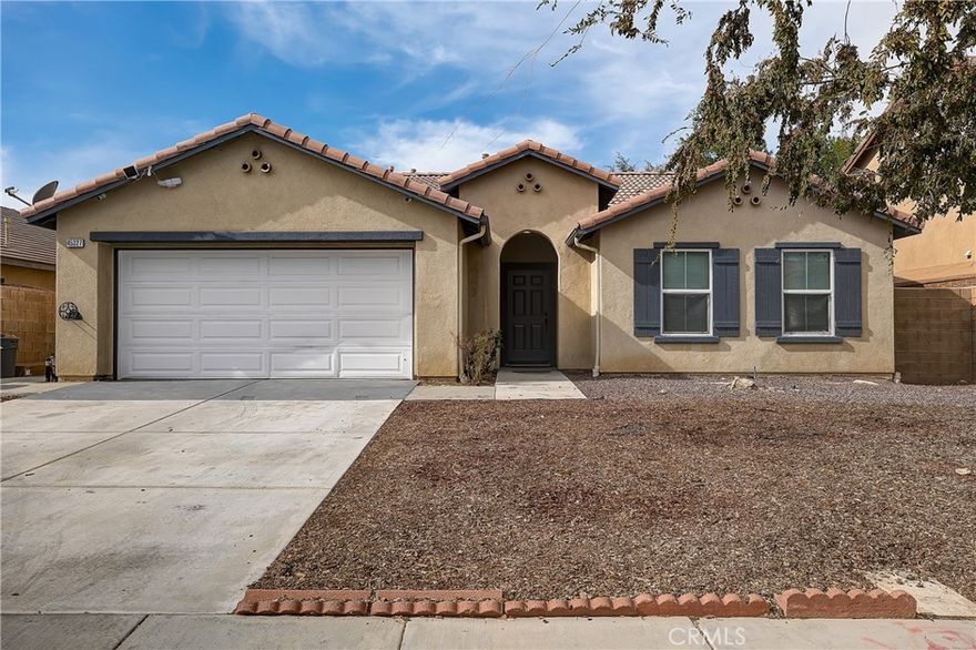 Adorable single-story home with a nice-sized backyard with grass and a large covered patio, @ 45327 Elm Ave.  This  3-bedroom, 2-bathroom home is Move in Ready!  The interior was recently painted, it has tile flooring, no carpet, a Kitchen with an Island, and a stainless steel gas stove. Nestled in a quiet Lancaster neighborhood, this residence boasts a bright and open floor plan, with ample natural light throughout. The living room provides a warm and inviting atmosphere, perfect for relaxing or entertaining. The kitchen offers ample counter space and cabinetry, making meal prep a breeze. All three bedrooms are generously sized, with the primary suite including a private bath for added comfort. Step outside to a spacious backyard, ideal for family gatherings, barbecues, or creating your own outdoor oasis. A large driveway and attached garage provide convenient parking and storage. Located near schools, parks, shopping, and easy freeway access.  Amazing curb appeal and split floor plan with the master suite on one side and two additional bedrooms on the other side of the home.  Come see this home today!
