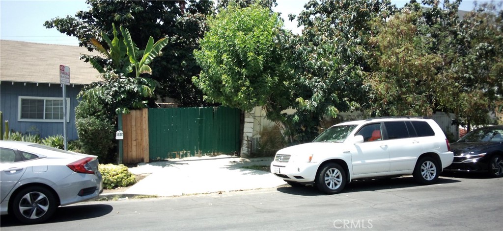 Incredible investor opportunity nestled in vibrant and eclectic East Hollywood, just a few memorable moments from Silver Lake and Virgil Village, where creativity meets culture amid indie cafés, local art spaces, hip hangouts, and ongoing redevelopment buzz. This unique multi-family property is identified as a triplex but currently has only one habitable unit—simple, basic and unrefined, with no recent upgrades. Two additional units are unfinished—one down to the studs, the other enclosed with walls but without interior finishes. Set on a gated and shaded 6,250 sq. ft. lot, the home’s natural canopy of mature shade trees helps keep bedrooms cool and adds to its peaceful charm. A blank canvas with outstanding potential for restoration, expansion, redevelopment, or the addition of value-add units. Nearby properties have undergone similar transformations, making this a strong opportunity for visionary buyers or developers with the means to unlock its income potential. Property offered as-is. Buyer to perform all due diligence and independent verification.