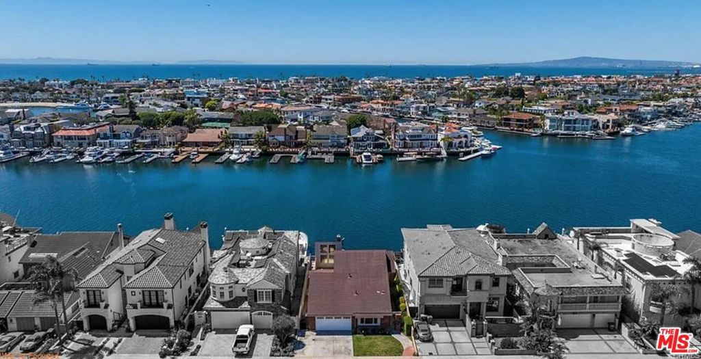 Original Model Home located on THE BEST water front harbor lot in Huntington Beach California! A diamond opportunity that encourages inquiries from around the globe! Current occupant require no disturbance.