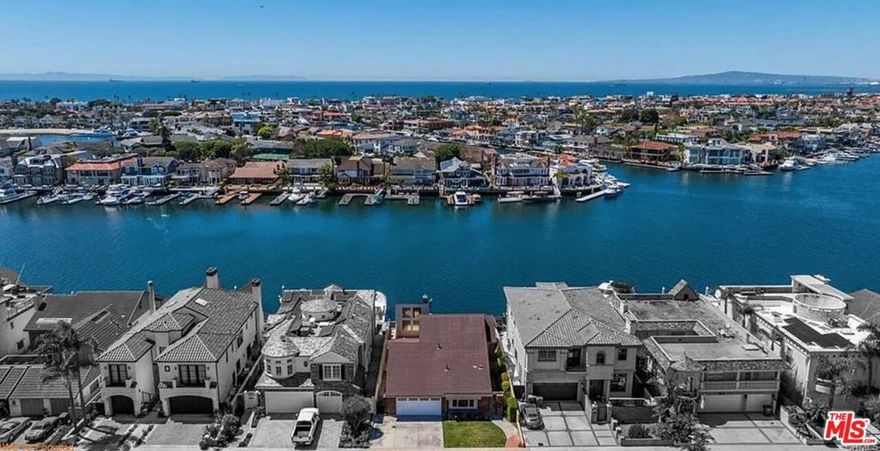 Original Model Home located on THE BEST water front harbor lot in Huntington Beach California! A diamond opportunity that encourages inquiries from around the globe! Current occupant require no disturbance.