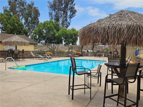 Photo of 5010 Los Morros Way #25, Oceanside, CA 92057 (MLS # SW26127013)