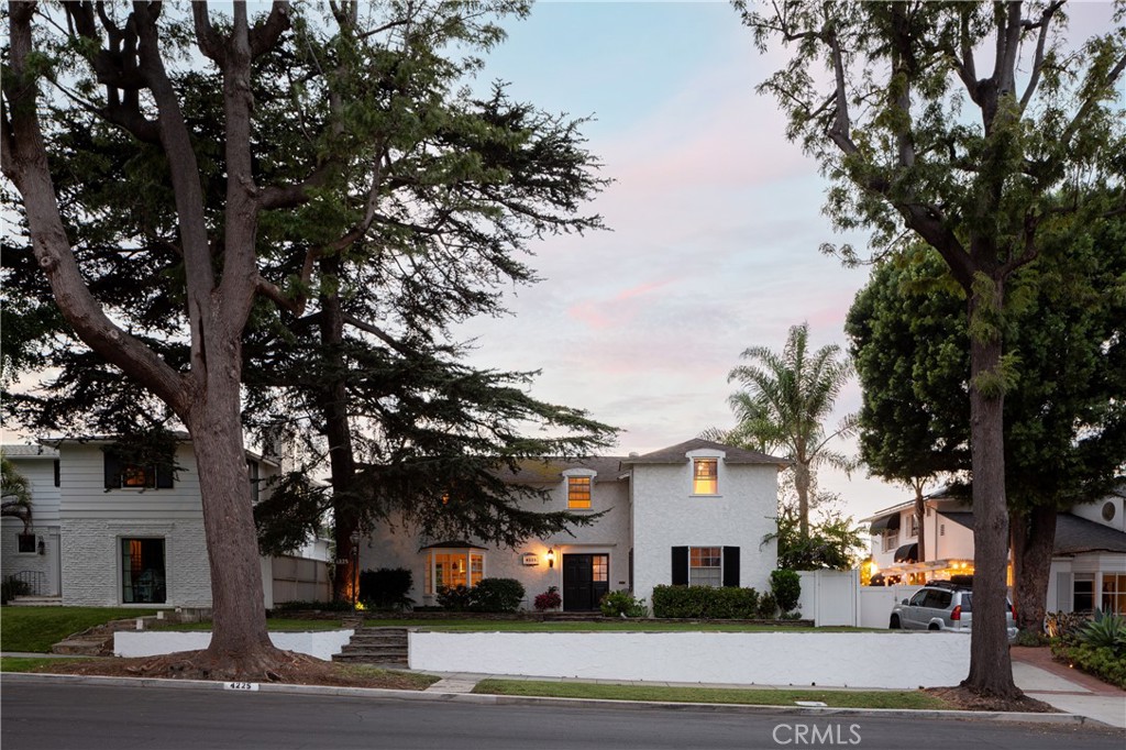 Step into a rare piece of architectural history with this 5 Bed, 3.5 Bath Kenneth Wing–designed masterpiece, perfectly set on the most coveted street in Bixby Knolls. Originally built in 1937, this home radiates timeless elegance while seamlessly blending modern upgrades — the kind of property that immediately feels like “the one.”
Inside, discover 3,023 sq ft of living space drenched in natural light. Rich hardwood and stone floors, coffered ceilings, intricate crown moldings, French doors, and bay windows showcase the craftsmanship of a bygone era. The formal dining room dazzles with a handcrafted Waterford Crystal chandelier, while the fireside family room invites cozy evenings with serene garden and pool views.
The chef’s kitchen is a dream: newly repainted cabinetry, Viking stove & oven, Sub-Zero refrigerator, Viking wine cadet, stone counters, and custom cabinetry — all open to the family room, making it perfect for gathering and entertaining.
Step outside and experience true California living in your private backyard oasis: a saltwater pool and spa with Baja shelf, outdoor kitchen & bar, covered patio with mounted TV, lush gardens, and even a personal farmer’s market with avocado, persimmon, lemon, and orange trees. Add in the 300 sq ft covered patio with its own outdoor bath & shower, and this home is primed for unforgettable gatherings.
Location is unbeatable — just steps from vibrant Atlantic Avenue with boutique shops, breweries, wine bars, and Michelin-starred dining. Plus, top-rated schools make this the perfect forever neighborhood.
Live the life where no detail is spared and every comfort is realized. This is more than a home — it’s a lifestyle. Don’t miss your once-in-a-lifetime chance to own a true Bixby Knolls icon.