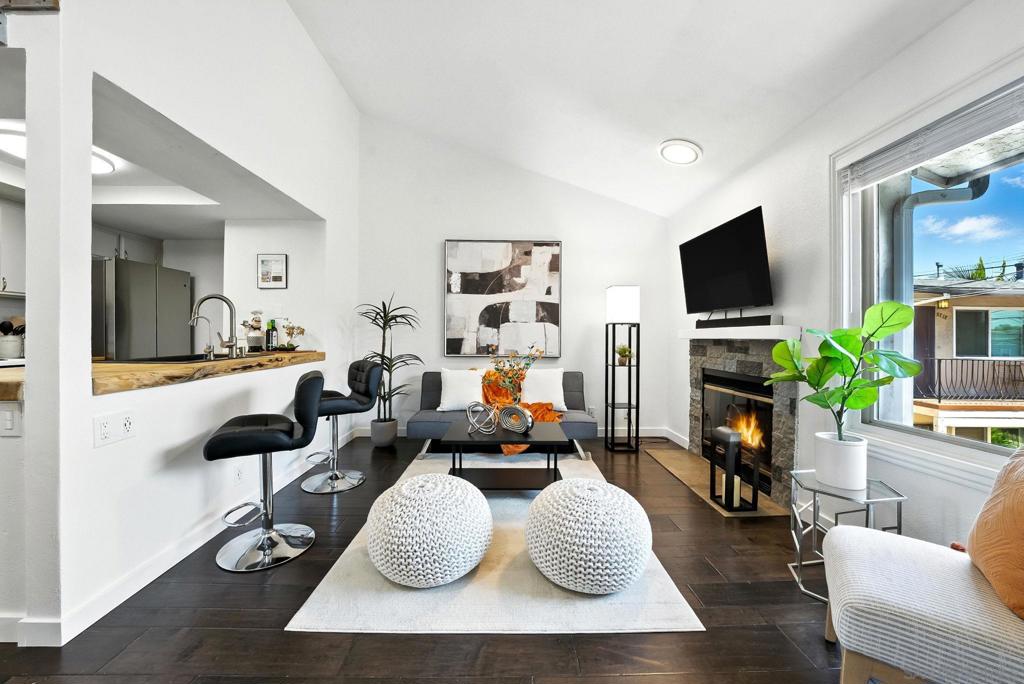 Welcome to your private retreat in one of San Diego’s most vibrant and walkable neighborhoods, Normal Heights! This beautiful top-floor 1-bed + loft, 1-bath condo with A/C, private garage, and additional parking driveway offers rare space, style, and flexibility in a peaceful pocket just steps from the energy of Adams Avenue. Soaring vaulted ceilings and an open, light-filled layout create an airy, welcoming vibe, while the versatile loft provides the perfect space for a home office, creative studio, or cozy lounge. Enjoy modern comforts like central heat and A/C, in-unit laundry, and a spacious walk-in closet. Step outside to your own private patio, ideal for morning coffee or relaxing in the San Diego sunshine. An assigned 1-car garage plus an additional off-street parking space in your assigned driveway offer exceptional convenience, a true rarity in the area. Nestled on a quiet, tree-lined street within walking distance of local cafés, boutiques, and eateries, this condo delivers the best of both worlds: tranquil living with an unbeatable urban lifestyle!