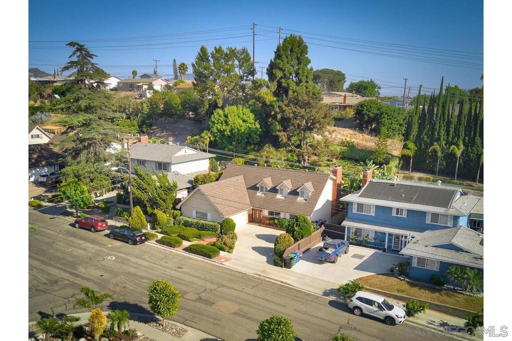 Don’t miss this incredible opportunity to own a beautiful home in the highly sought-after San Carlos community of San Diego, just a short walk from Lake Murray. This charming 4-bedroom, 3-bathroom home is located in a top-rated school district, making it perfect for families. The downstairs room has been transformed into a cozy theater room and family room, but can easily be converted back into a bedroom to suit your needs. This home is ideally situated close to everything San Carlos has to offer, including shopping, dining, parks, Lake Murray, Cowles Mountain, Mission Trails, and easy access to Interstates 8 and 125. Experience comfort and convenience in a prime location with this must-see home!