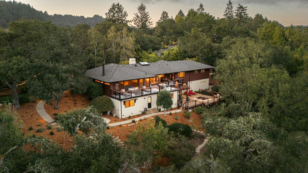 Soulful retreat in remarkable Happy Valley setting, w/grt community vibe & close-in commute location. Mesmerizing views, relaxed ambiance, nice privacy & long list of contemporary upgrades. 2.8 acre park-like parcel w/old oaks, landscaped grounds, native plantings & resort-style amenities: outdoor spa, shower, fire pit, wraparound decks. built-in benches, dramatic night lighting. 4br, 3.5ba, 3100 sq ft home w/timeless arts & crafts feel, birdseye maple cabinets, hdwd floors, natural stone counters, slate hearth. Experience an iconic indoor/outdoor lifestyle. Myriad options for sun/shade, al fresco dining, family entertainment & stargazing. Comfortable open kitchen plan w/pantry, bar seating, formal dining stainless appliances, skylight & walls of windows that frame the views. Ground floor br w/full bath. Primary suite w/extra art space & bath w/Carrera marble, glass shower, soaking tub. No detail overlooked: new roof, decks, forced air furnace & AC, water filtration, generator, gig speed wifi, translucent gar. door. LED lighting &LG Signature Washer/Dryer. Fruit trees & room for garden & chickens. Professionally landscaped w/low maintenance lawn. A profound sense of place w/a mindful connection to nature. Acclaimed Happy Valley school nearby, only 25 minutes to Los Gatos.