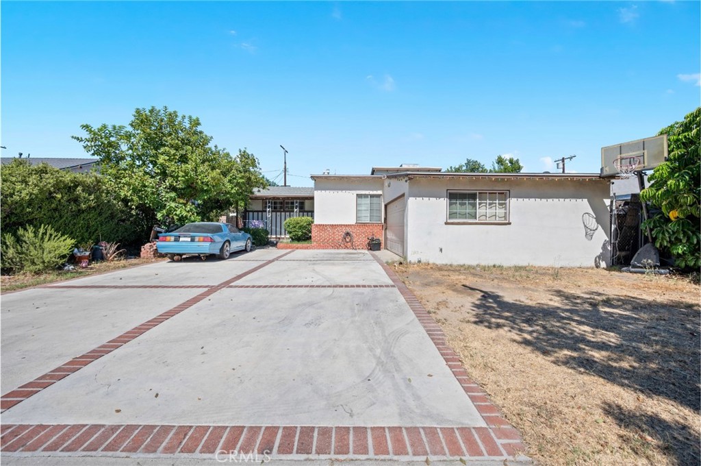 Discover potential in this 1,217-square-foot home in the heart of Arleta. Major updates are already in place, including a roof under 10 years old, central air conditioning, and bedroom flooring replaced 3 years ago, a newer water heater, and a pool fully refurbished with new plaster, plumbing, and water systems. The driveway, completed 2 years ago, adds curb appeal and convenience.
With solid bones and a flexible 3-bedroom, 2-bathroom layout, this home offers a rare blend of space, functionality, and future upside in a steadily evolving neighborhood. In addition to well-sized bedrooms and adaptable living areas, a step-down rec room adds versatility and can serve as a den, home office, playroom, or additional lounge space.
Conveniently located near shopping and transit, this property offers long-term value for buyers who appreciate usable space and future upside in this established part of the Valley.