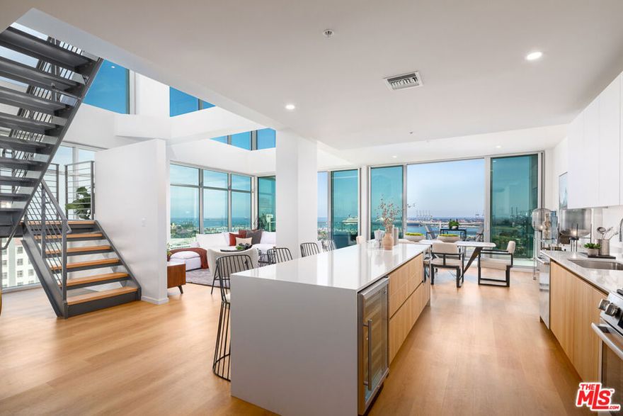 Welcome to the exclusive penthouse collection at 200 West Ocean, where luxury meets modern design in the heart of Downtown Long Beach. Each residence features spacious, open layouts with Italian cabinetry, floor-to-ceiling windows, motorized shades, and private balconies that offer uninterrupted views of the city and ocean. The impressive double-height living areas, reaching 20 feet, create an unparalleled sense of space and grandeur. Enjoy the convenience of monthly concierge services, including housekeeping, car washes, and dry cleaning.Residents can access resort-style amenities such as a pool and spa, a rooftop deck with a pool house pavilion, lounge areas, and a state-of-the-art fitness center. The building also showcases art by local creators and offers keyless entry for a seamless living experience. Steps from Alamitos Beach and the Downtown Long Beach Station, you're perfectly connected to LA's top destinations, from Santa Monica to Hollywood.Discover luxury redefined at 200 West Ocean. Contact us today to schedule your tour!
