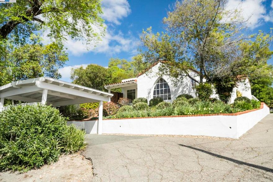 Incredible opportunity to own a single family with attached ADU on the highly desirable Westside of Danville. Just a short walk to downtown shops, restaurants, and the Iron Horse Trail, this charming property sits on a generous 12,632 sq ft lot and features two separate units, each approximately 1,200 sq ft. The front unit offers 2 bedrooms and 1 bathroom and is filled with character and natural light and too many updates to list. Highlights include a striking arched window, hardwood floors throughout, arched doorways, and fresh interior paint, new roof, newer furnace and water heater. Lovely updated kitchen features white cabinets, beautiful countertops and plenty of cabinet space. A spacious, private backyard includes a large deck, mature landscaping, and established garden beds. This unit has a strong rental history and typically leases for $4,000 per month. HUGE driveway with potential to house RV and/or boat plus 2 carports. Rear unit includes 2 bedrooms and 1.5 bathrooms with a cozy family room, brick fireplace, and skylights. The galley kitchen provides efficient layout and functionality, and the unit also includes ceiling fans and laundry facilities. Currently rented to a reliable month to month tenant at $3,000 p/mo.
