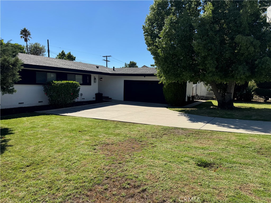 Completely remodeled ONE story home in Porter Ranch! Welcome to this modern updated 4 bedrooms + 2 bathrooms home 2,000 Sq Ft of living space on 11,003 Sq Ft lot. The entire house has been freshly painted inside and out. Living area has high ceilings a fireplace with an open floor plan, and refinished hardwood floors throughout. Bonus room next to the living room can be used as a formal dining room or home office. Gourmet kitchen with granite counter tops, white cabinets and with all new black appliances, stove, refrigerator, dishwasher and sink. Up to date laundry room with plenty of storage. All the bedrooms are spacious and have wooden floors with modern light fixtures. Large master bedroom with newly installed shower, double sink vanity, faucets, and shower door and contemporary tile walls. There is an enclosed sunroom for year-round entertaining. Large backyard with a lot of space, green luscious grass, and a new recently placed fence on the yard. This beautiful home is located on a corner street. One of the most desirable locations of Porter Ranch with award winning schools and close to The Vineyards at Porter Ranch and shopping centers. Easy freeway access and much more. Come view, fall in love and make this your beautiful family home! Small dogs ok under 30 pounds.