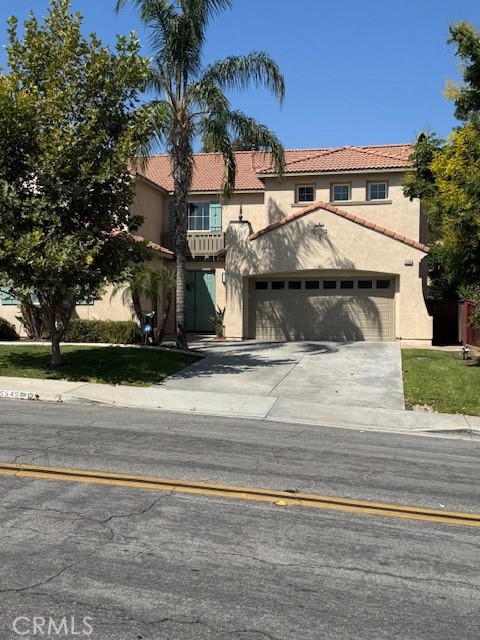 Beautiful two-story home in a very desirable and prestigious area of Moreno Valley. High ceiling double-door entry area. Four bedrooms upstairs and a sizeable loft area. The master bedroom has two walk-in closets and a large retreat area, which can be a work/exercise/baby room. One bedroom downstairs with a full-size bathroom next to it.. Beautiful remodeled Kitchen, quartz countertops, Open floor plan, where you can cook and entertain friends and family. Extra-large laundry room. Back yard features a very professionally-built, large covered patio the length of the house. Two separate all-drywall garages accommodate 3 car parking. Electric service in the garage is ready to charge all EVs.The interior of the house was painted a little over 1 year ago. Luxury vinyl waterproof flooring was also installed about a year ago. Close to shopping centers, parks, schools, Moreno Valley Community College, Lake Perris & Kaiser Permanente. NO HOA