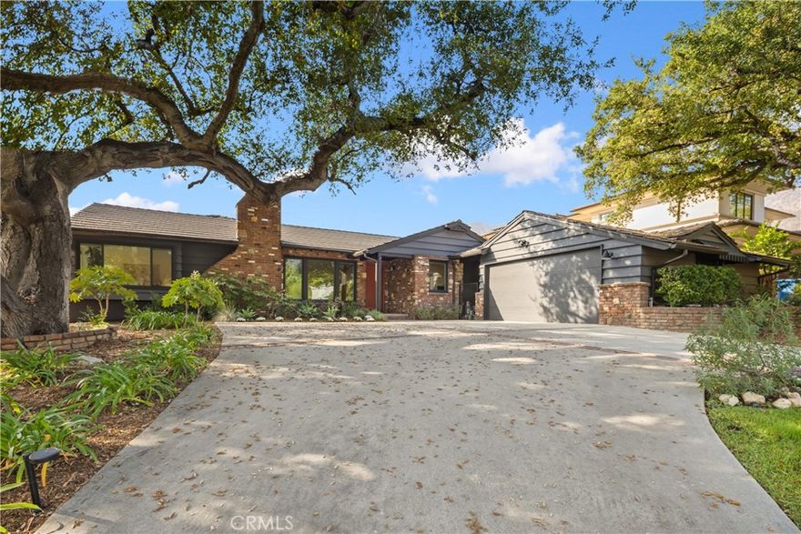 This beautifully remodeled residence, located on one of the most picturesque streets in Arcadia’s coveted Highland Oaks neighborhood, perfectly blends timeless elegance with modern comfort. The open and inviting floor plan showcases refinished solid hardwood floors, new tile flooring, and abundant natural light streaming through all-new windows and sliding glass doors. The chef’s kitchen is a masterpiece, featuring custom cabinetry, sleek quartz countertops, designer tile backsplash, and a spacious walk-in pantry. Every system has been thoughtfully updated, including upgraded electrical and plumbing, high-speed internet cabling, and new HVAC system with UV sanitizer. Additional highlights include a brand-new roof and rain gutters, stylish exterior lighting, and refreshed landscaping that enhances the home’s inviting curb appeal. Combining modern amenities with the serenity of the Highland Oaks community and prestige of the Arcadia Unified School District, 1709 Alta Oaks Drive represents a rare turnkey opportunity in one of Arcadia’s most sought-after neighborhoods.