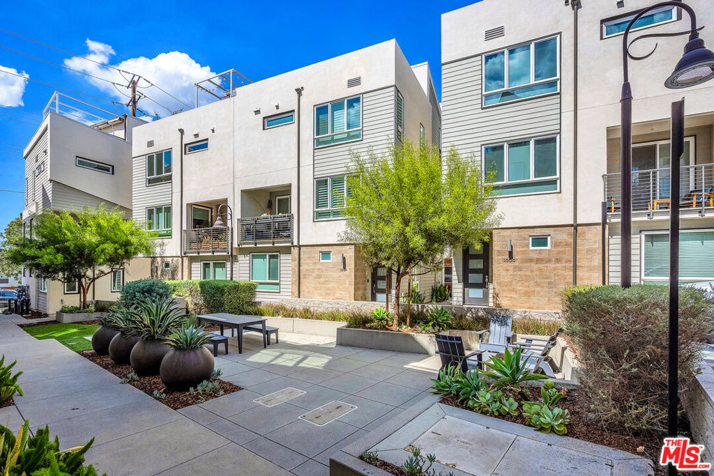 Welcome to East Alloway Court, nestled in a sought-after enclave in the heart of Highland Park. This modern tri-level townhome, meticulously designed for the contemporary lifestyle, spans 1,863sqft of open-concept living. With 3 bedroom en-suites, 4 total bathrooms, the residence offers ample space for comfort and luxury. Experience the ease of smart living with WiFi-operated heating, cooling, and lighting systems in the main living area and primary suite. The kitchen is enhanced by a built-in water filtration system, catering to both convenience and quality. A balcony and a top deck provide captivating views, perfect for relaxation or entertaining. The property includes a direct access two-car garage and additional guest parking on the grounds. Enjoy the convenience of a washer and dryer within the unit, air conditioning, and private outdoor space. Unfurnished and ready for your personal touch.