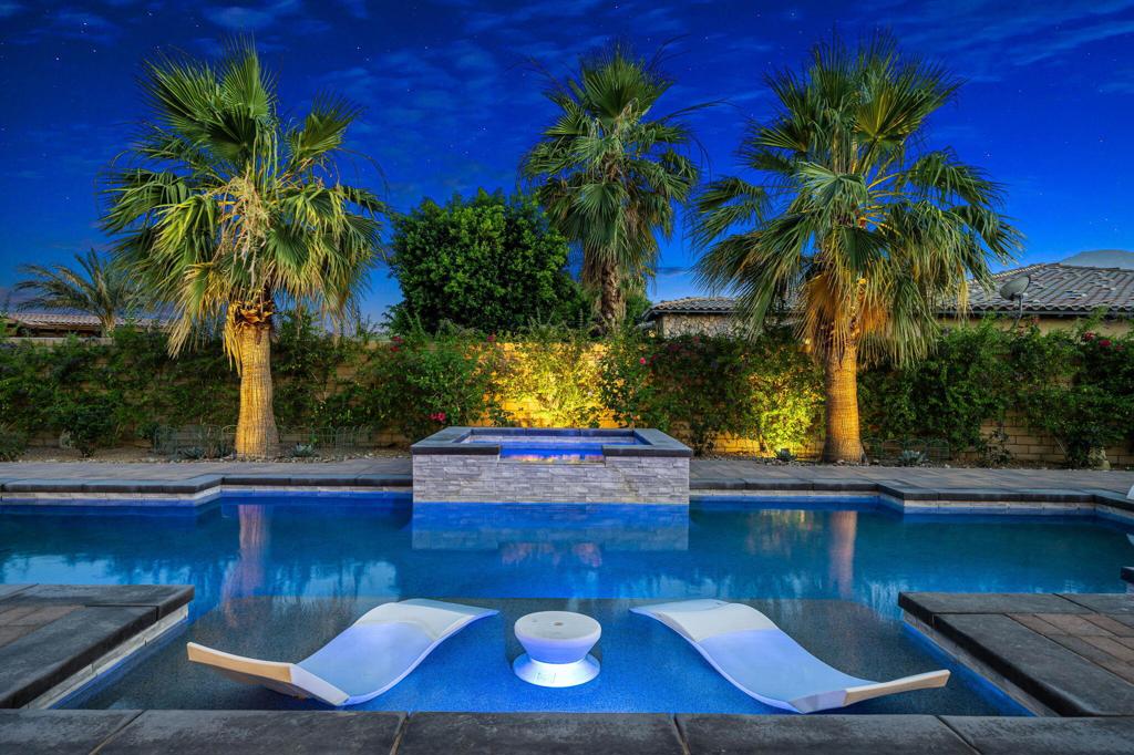 Welcome to this stunning luxury estate in the exclusive guard-gated community of Griffin Ranch in La Quinta! This expansive residence offers over 4800 square feet of sophisticated living space, featuring four spacious en-suite bedrooms and 4.5 baths designed with elegance and comfort in mind. Entertain your guests in style with a resort-inspired backyard complete with a sparkling pool and spa, built in BBQ, fire pit, ample outdoor lounge space and beautiful lush landscaping all set against a breathtaking backdrop of the surrounding mountains. The chef's kitchen flows seamlessly into the the generous living and dining areas, ideal for for entertaining your family and friends. This luxury estate is perfectly located near world-class golf courses, upscale shopping, fine dining, tennis, pickleball and hiking. This home offers the best of desert luxury living come and experience the ultimate in privacy, style and convenience at your dream retreat in the heart of La Quinta! This home is offered as a luxury seasonal lease. Owner will also consider a long term lease, for lease rates please contact listing agent.