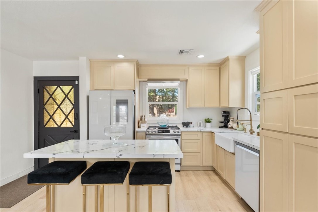 Fully Renovated Colton Home with Modern Upgrades & Expansion Potential!
Welcome to 1456 N 9th St—an impressively remodeled home (2023) located just one mile from Inland Center Mall, offering top-tier shopping, dining, and entertainment. This beautifully upgraded residence features an open-concept layout filled with natural light, double-door entry, and smart recessed lighting throughout.
The gourmet kitchen boasts granite countertops, a center island, new double-paned windows, and a full suite of stainless steel Samsung appliances, including a gas stove, refrigerator, dishwasher, and microwave. Enjoy year-round comfort with central air, a Nest-controlled HVAC system, and a cozy gas fireplace in the living room. The stylishly remodeled bathroom includes a tempered glass enclosure and rain shower for a spa-like experience.
Additional upgrades include waterproof vinyl flooring, a new 200-amp electrical panel, PEX plumbing throughout, and a recently redone roof. Energy efficiency is enhanced with a leased solar system at just $93/month.
The spacious lot offers endless possibilities with room for expansion or an ADU. Step outside to a large patio, ideal for entertaining or relaxing in your private backyard. The finished garage features cabinets, upgraded flooring, an automatic opener, and includes a smart washer and dryer.
This is a turn-key home blending comfort, technology, and future potential—all in a centrally located Colton neighborhood