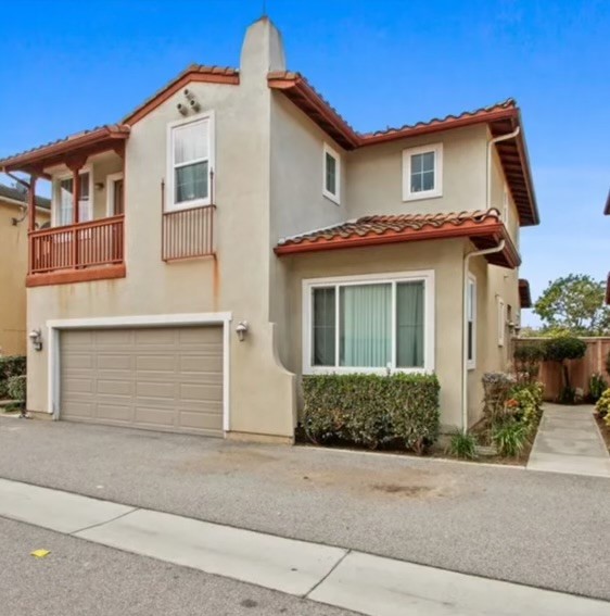 Experience the charm of 229 E 220th St in Carson — a beautifully designed two-story home featuring 5 spacious bedrooms and 3 full bathrooms. With over 2,000 square feet of living space, this 2006-built residence is tucked away in Carson’s peaceful southern neighborhood, providing convenient access to nearby shops, parks, and schools. The welcoming open floor plan showcases elegant hardwood floors and a contemporary kitchen equipped with granite countertops. A private bedroom on the first floor adds flexibility, while the upper level includes four more bedrooms, highlighted by a generous master suite complete with a walk-in closet. Practical amenities such as a dedicated laundry room, a secure WiFi-enabled entry door two-car garage, and a delightful outdoor living area enhance the home’s appeal. Well cared for and offering abundant parking, this property is the perfect retreat for families eager to enjoy the vibrant lifestyle of South Bay.