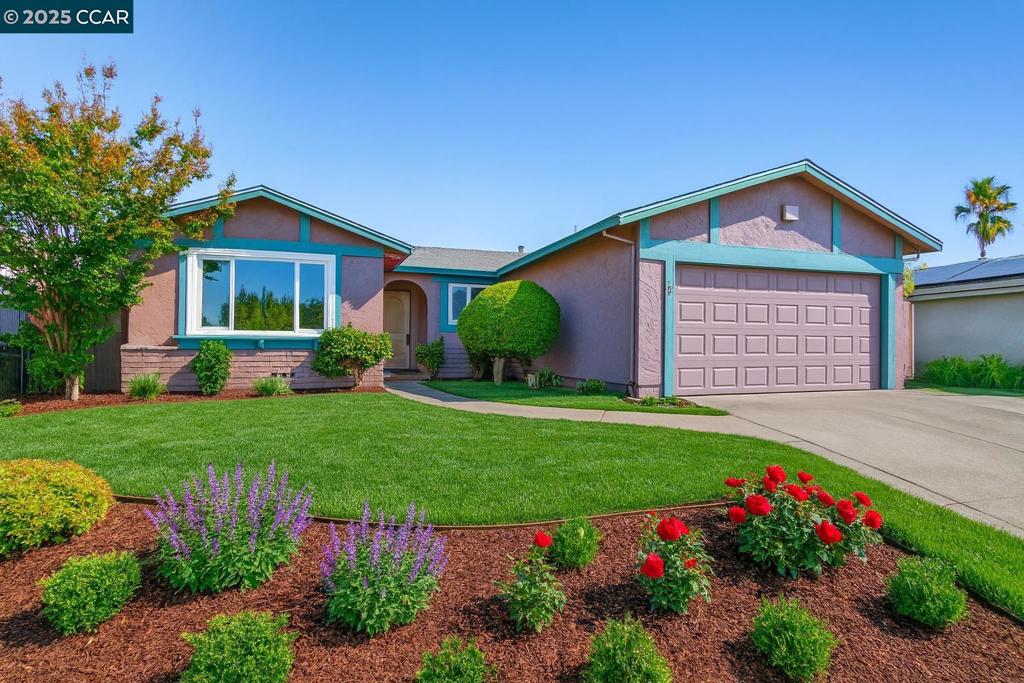 Move-in Ready & Full of Charm! This inviting 3BD/2BA home boasts brand-new carpet, fresh interior paint, and a chef’s eat-in kitchen at the heart of the home- complete with a pantry, farmhouse sink, gas range, built-in microwave, refrigerator, and dishwasher. The versatile floor plan offers both a family room and a living room, with the potential for a 4th bedroom. A unique second kitchen in the garage adds extra flexibility for entertaining or extended living arrangements. Enjoy the benefits of solar for lower energy costs, and step outside to a spacious backyard that’s a blank canvas- ready for you to create your dream outdoor oasis. (Landscaped photos are digitally enhanced).
