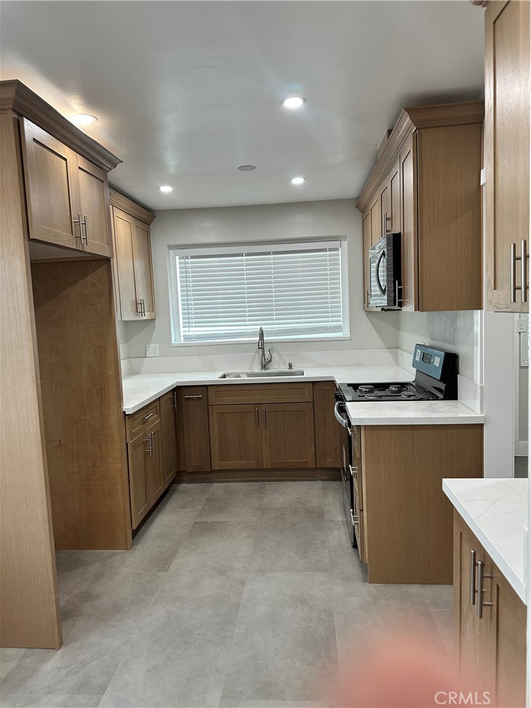 Properties 2 9308 Badminton Avenue