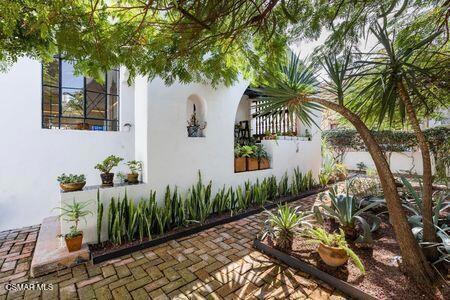 Historic Charm in the Heart of AmericanaA property that has it all: history, location, and an architectural style you simply don't find every day.Located on one of the most iconic streets in the Americana neighborhood, this residence combines the character of its era with renovations that make it perfectly functional and ready to move in. Its 492 m of land and 412 m of construction offer spaciousness, privacy, and a flexible layout.The house has four bedrooms, four full bathrooms, and a room with independent access, ideal for guests, a home office, or a studio. There is also an office or studio area upstairs and parking for up to five cars, something rare in this area.From the main entrance, there is a double-height foyer that leads to the main spaces: a brightly lit living and dining room, a beautifully remodeled kitchen, a TV area, and a central courtyard with a quarry fountain that becomes the heart of the home. This floor also houses the master bedroom, with a bathroom, tub, and private patio, as well as an additional guest room and full bathroom.Upstairs, there are two secondary bedrooms that both have access to a bathroom, a third bedroom with its own bathroom and independent access, and four terraces that offer different corners for relaxing or spending time outdoors.The entire infrastructure of the house was renovated: electrical, plumbing, drainage, and gas systems, all updated to ensure comfort and safety.This property not only boasts pleasant spaces but is also versatile. It can be used as a private residence with plenty of personality, a boutique hotel, or even a restaurant with an unparalleled atmosphere. And thanks to its location--in the heart of an area of constant growth and great cultural value--it is also an excellent investment.It should be noted that this house was built by architect Rafael Urzua--one of the great names of the era and a collaborator of Luis Barragan--and is a true gem in the middle of the city.AmenitiesBalconyCovered parkingGarageYardTerraceAccessibility for older adultsIntegral kitchenUtility roomPets allowed