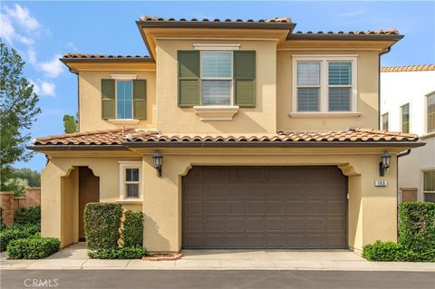 Photo of 166 Desert Bloom, Irvine, CA 92618 (MLS # OC26018842)