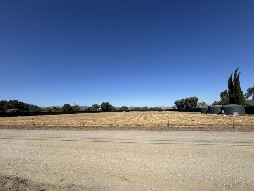 Nice Level lot in beautiful Day Valley, with conditional site approval and approved plans.  The owner will consider carrying the financing at 6% with 50% down. Percolation tests completed and approved for existing home plans.  Well, pump, and storage tanks are in.  The lot is fenced on three sides with new fencing.  Electricity at the street.