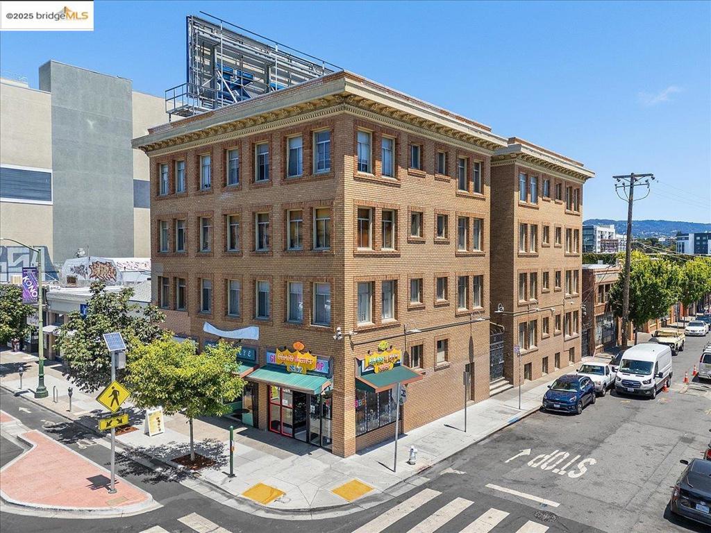 Rare opportunity to own a well maintained 28-unit mixed-use property in Oakland’s thriving Uptown neighborhood. Located at 498 25th Street, this freestanding 4-story building was originally built in 1913 and effortlessly blends timeless architectural charm with modern upgrades, offering both strong income potential and an exceptional living experience. Tenants also, enjoy the ease of on-site laundry facilities and a secured private entrance, enhancing comfort and peace of mind. The property includes 25 residential units, 3 retail suites and additional income from a rooftop billboard. This diligently maintained property presents a rare chance to acquire a high-performing asset in one of Oakland’s most iconic neighborhoods. With a diverse unit mix, modern amenities, and strong income potential, this is an investment opportunity not to be missed. Don’t miss your chance to own a piece of Oakland’s history while securing a high-performing income property.