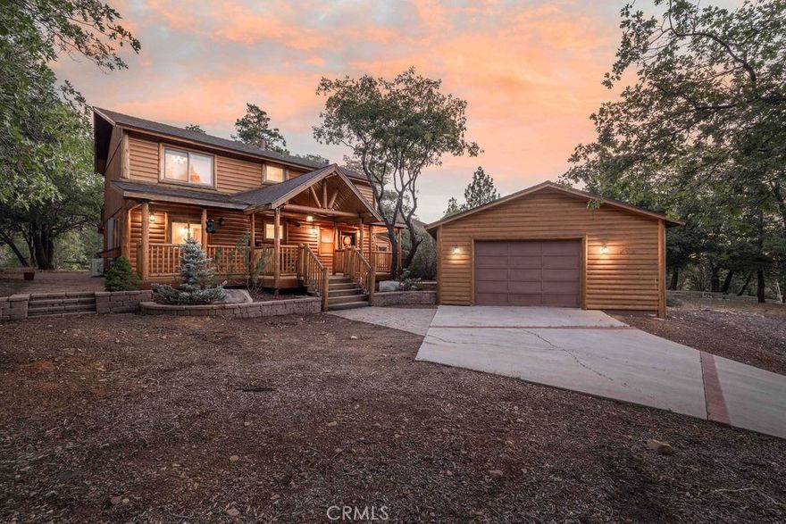 Beautifully updated Moonridge retreat backing directly to the National Forest on a rare flat lot with no rear neighbors, incredible views, and unmatched outdoor access. The backyard feels like forest-front property offering space to play, hike, or sled right from your door, with panoramic views of Bear Mountain from the back decks. Unlike many sloped lots, this lot is usable, kid and pet friendly, and ideal for year-round enjoyment. Inside, the home blends mountain charm with modern updates, including vaulted beamed ceilings, two fireplaces, a spacious family/game room, and a bonus office currently used as a 4th bedroom. Bathrooms have been tastefully remodeled with new tile, vanities, tubs, and fixtures. The kitchen features stainless steel appliances and newer cabinetry, opening to a warm and inviting great room with forest views through expansive windows. Nestled on a well-treed, serene street just minutes from the slopes, lake, golf course, zoo, and the new Moonridge Corridor. Complete with a 2-car garage and generous parking, this property truly has it all!