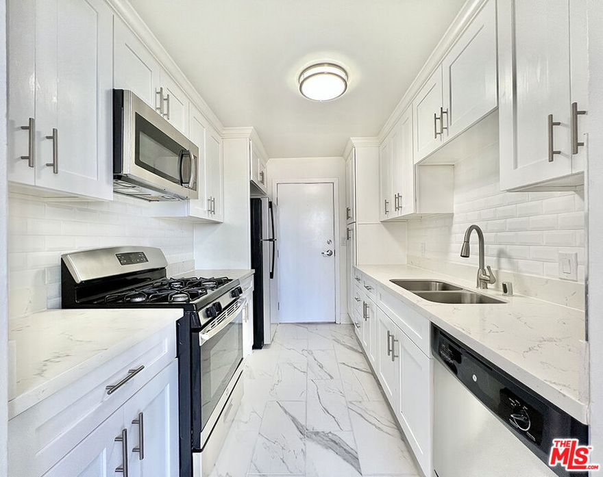Light and bright, spacious, open floor plan, 2 bed/ 2 bath unit, located in the heart of Beverly Hills. This recently updated unit has a beautiful modern kitchen with a gas range, microwave, dishwasher, and fridge plus there is a bonus, separate kitchen entrance! The remodeled bathrooms have spa like sleek vanities, top of the line fixtures, and a luxurious floor to ceiling tiled shower. Closets, closets, and more closets...in the hallways and oversized bedrooms. Both bedrooms open onto a large balcony. Exceptionally well maintained building, perfectly manicured landscaping, recently remodeled lobby and hallways. Plus...spotless and large laundry rooms on every floor and security cameras throughout. Perfectly situated by Roxbury Park, Walking Score of 80, within minutes of world renowned shops and restaurants in Beverly Hills and Century City. Rent includes parking.