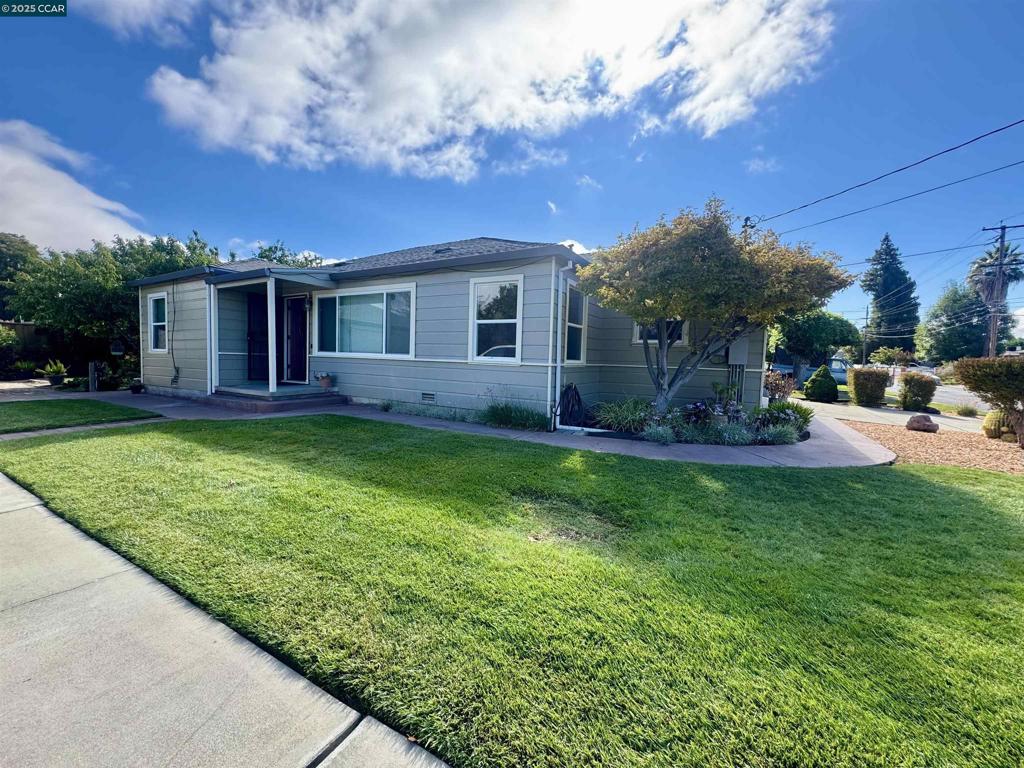 GARDNER'S DELIGHT! Discover this charming ranch-style home located in the desirable Monte Gardens neighborhood. This inviting residence boasts modern amenities such as central air conditioning, dual-pane windows, a newer roof, fresh paint and designer lighting. The kitchen has been beautifully updated with quartz countertops and new designer lighting, while the bathroom features quartz counters, stylish tile flooring, and updated lighting with a modern mirror. An amazing detached garage offers incredible potential to be converted into an additional home or ADU, adding outstanding value and versatility to the property, while the attached two-car garage provides everyday convenience and functionality. The Stunning and meticulously maintained yard is a true highlight, offering a serene outdoor retreat. Additional features include well water for irrigation, ensuring lush greenery. This home is move-in ready and waiting for its new owners to enjoy.