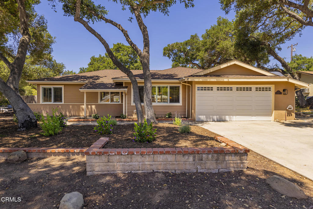 Tucked beneath a canopy of majestic oak trees in one of Ojai's most welcoming neighborhoods, this well-maintained 3 bedroom, 2 bath home sits on just under a quarter acre and offers a spacious floor plan. The layout is both comfortable and functional, offering a seamless connection between indoor and outdoor living. The primary bedroom features its own en-suite bath, providing a private and peaceful retreat within the home. The spacious kitchen is a standout feature ideal for everyday cooking or entertaining, with plenty of room that any home chef would appreciate. The backyard is a blank canvas, perfect for creating a garden retreat, building an outdoor kitchen, or designing the outdoor space of your dreams. Whether you're looking to relax or entertain, there's plenty of room to make it your own. Centrally located between downtown Ojai and Ventura, the home offers easy access to local shops, restaurants, and the beach. Outdoor enthusiasts will love being just steps from the Ojai Valley Trail, the Ventura River, and a variety of scenic hiking routes. With convenient access to Lake Casitas, Carpinteria, and Santa Barbara, this property offers the perfect blend of comfort, location, and easy living!