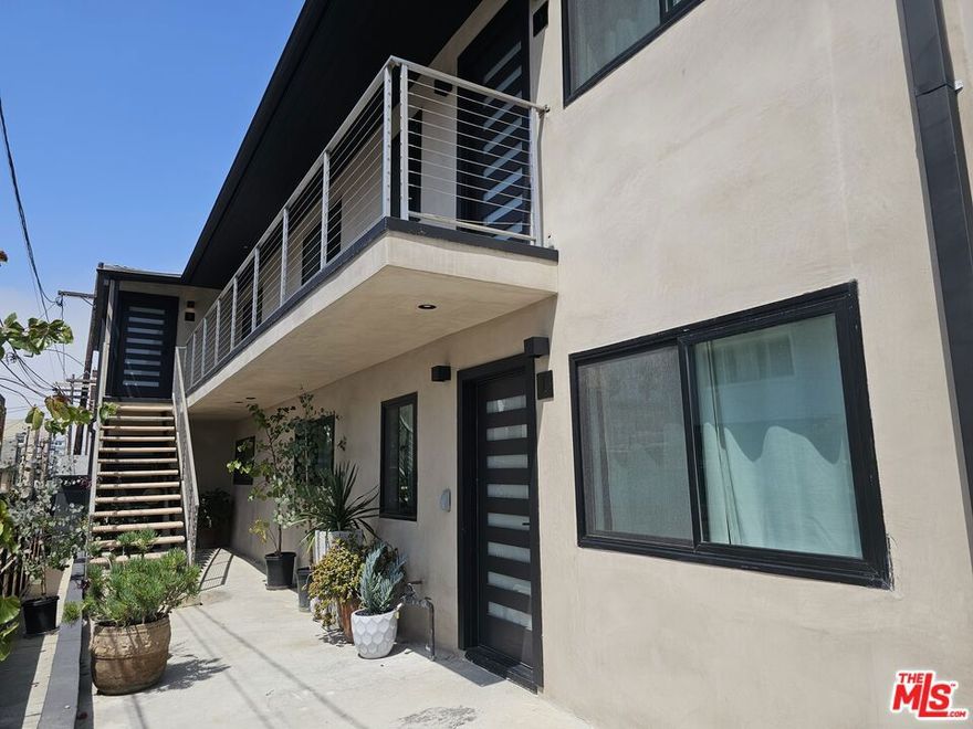 We are excited to introduce you to 17 Sunset, a beautifully reimagined, designer-done fourplex in Venice Beach. This property offers views of the beach and ocean with quick access to the sand and boardwalk. Centrally located near Rose Avenue, Brooks, Main Street, and Abbot Kinney, this year-round destination attracts both renters and tourists. It's an ideal opportunity for an owner-user or an investor seeking an upgraded property at the beach. This modern and updated fourplex is ready to accommodate any business plan. Each unit has been uniquely designed with high-end fixtures and finishes, including hickory wood floors, new doors, and Emtek hardware. The custom kitchens feature a Z-line gas stove with a custom oak range hood, a paneled dishwasher, and cleverly hidden stackable laundry. Each unit offers two bedrooms and one bath, with ceiling fans in each bedroom. The luxurious finishes, ranging from marble designer tiles and counters to quartz, gold, bronze, and matte black fixtures, truly set this property apart. Additional upgrades include updated plumbing and electrical, recessed lighting, tankless water heaters, and a mini-split system in each unit, allowing for higher-than-average rents. There is also potential to add an Accessory Dwelling Unit (ADU) above the detached three-car garage. Parking is abundant with seven spots in total, including space between the garage and the main structure, and on the driveway. The exterior boasts a lovely tan stucco finish on the front, matte black vinyl windows and fence, and tasteful landscaping to enhance curb appeal. Some units are month-to-month, so there is a possibility to deliver one or two units vacant.