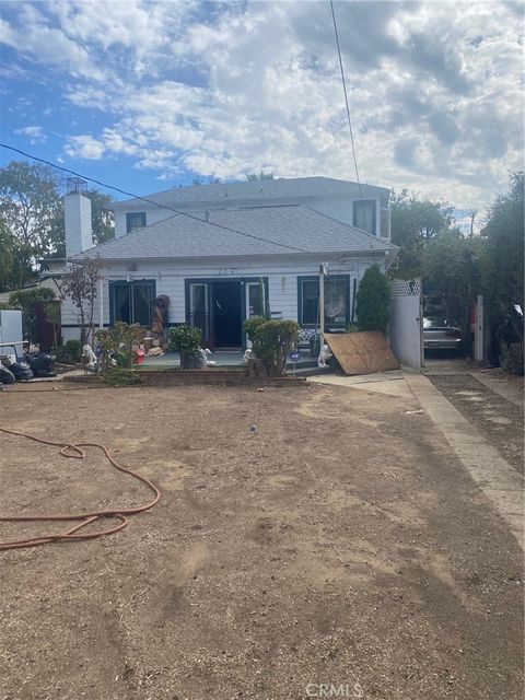Photo of 214 S Avenue 66 Ave, Los Angeles, CA 90042 (MLS # IG25277688)
