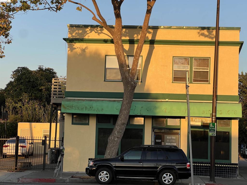 New paint for exterior walls! Built in 1939, building is 3,010 sq. ft. Lot size 4,500 sq. ft. Fully occupied, annual income is about $71,000.00. 4 parking spaces, iron fence gate with electric openers.Downstairs is commercial space currently use for boxing training. , upstairs and back are residential. Located in the corner of 2 busy streets, good for business and living! Unit 2351 $2596.88/month Unit 2353 $1800.00/month Unit 2351 1/2 $800.00/month Unit 2351 1/2 $725.00/month