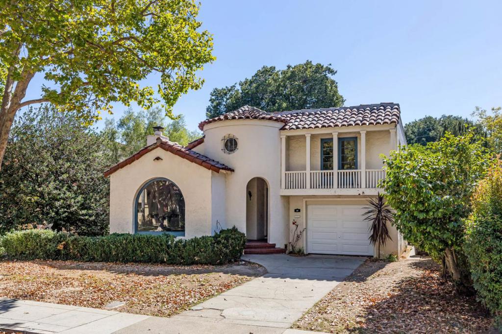 Architectural Gem in Sought-After Aragon Ready for Your Dream Transformation! Welcome to Aragon, one of San Mateo's most enchanting neighborhoods just blocks to Central Park and all of the vibrant amenities of downtown. Here on the sidewalk-lined streets, canopied by mature trees, this architectural gem is ready to transform into your own dream vision for the future. Classic Spanish Colonial design elements - distinctive arches, a cylindrical front turret, and red tile roof - exemplify the home's circa 1932 heritage. Hardwood floors, ceiling beams, and iron trusses and sconce lighting continue the architectural style inside where a spacious living room with focal-point fireplace and formal dining room take center stage on the main level. Up a short flight of stairs, two bedrooms, one opening to the signature front balcony, are served by a vintage bathroom in retro color. Outside, there is plenty of space for play, fresh-air living, and gardening. Welcome home!