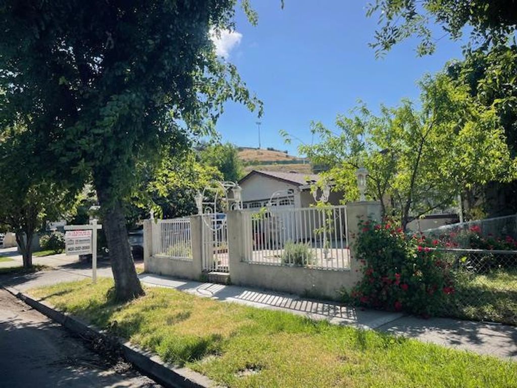 Photo of 416 Harmony Lane, San Jose, CA 95111 (MLS # ML82043280)