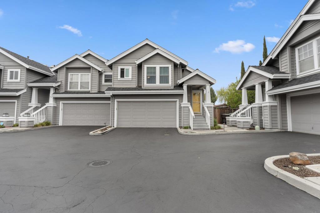 Remodeled and Move-In Ready Townhome in Vibrant Downtown Campbell! This spacious and quiet end-unit townhome feels like a single-family home and is just a few short blocks from all that Downtown Campbell has to offer, restaurants, boutique shopping, coffee shops, Los Gatos Creek Trail, Campbell Park, and the beloved Sunday Farmers Market. Beautifully updated throughout, featuring all new dual-pane windows, a new high-efficiency heat pump, and new stainless steel kitchen appliances. The light and bright kitchen also includes quartz countertops, crisp white cabinetry, large pantry, and easy access to the attached two-car garage. Freshly painted from throughout, this home offers a large living room with a cozy gas fireplace, a wet bar for entertaining, and a great flow to the private, fenced backyardone of the largest in the communitycomplete with a patio and garden space. Upstairs, you'll find three generously sized and sunlit bedrooms, two skylights, a conveniently located laundry area, and beautifully remodeled bathrooms. Nestled quietly at the back of the community and set away from the street, this property offers privacy, comfort, and convenience in an unbeatable location. A rare opportunity to own a turnkey home in one of Campbells most desirable neighborhoods!